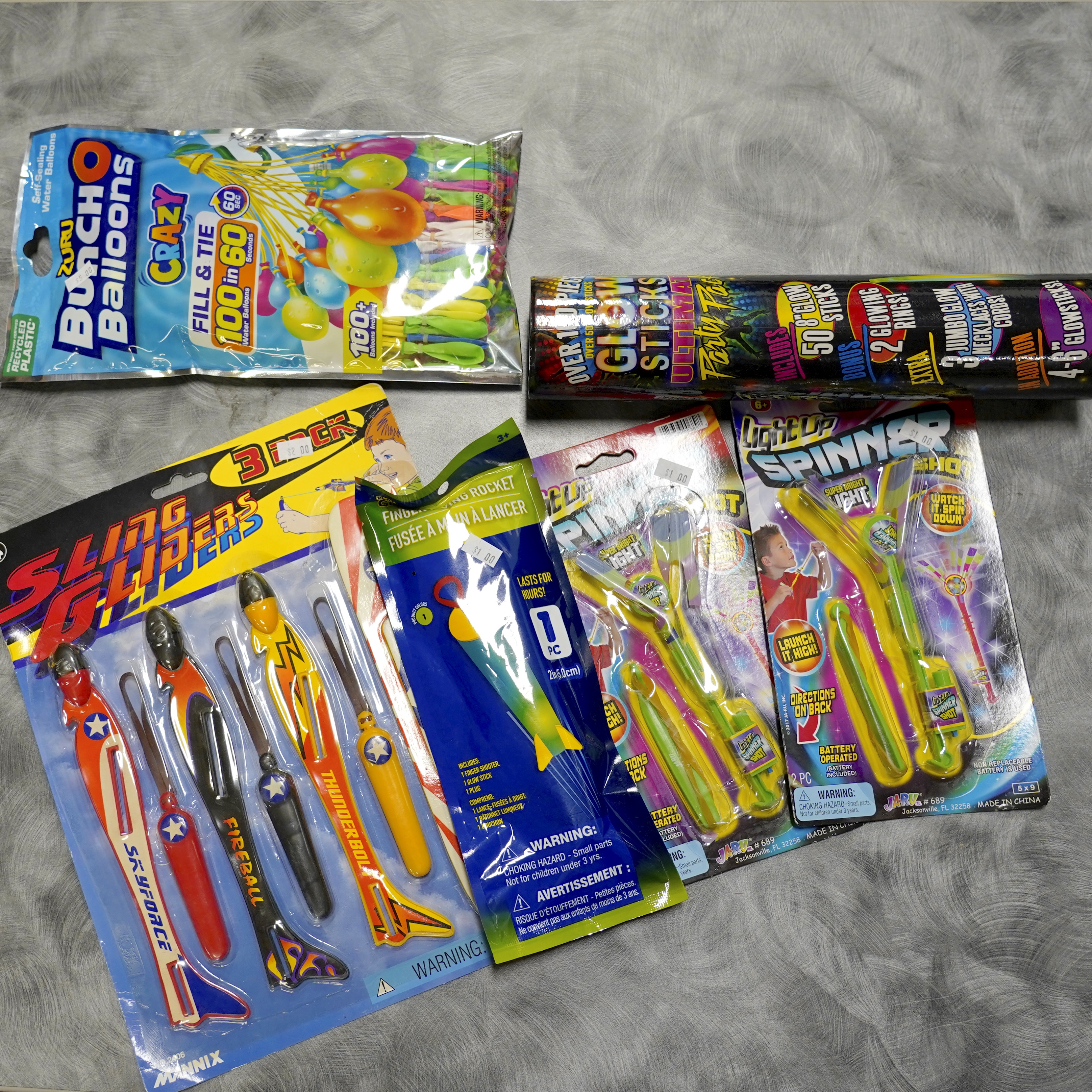 New Kids Toys, Including Gliders, Glow Sticks, and Water Balloons