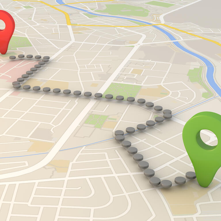 Map showing a route between a red and green location indicator.